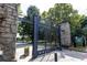 Entrance to Piedmont Park with stone pillars and iron gates at 1230 Piedmont Ne Ave # 405, Atlanta, GA 30309