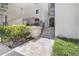 Exterior entrance with staircase and elegant landscaping and security features at 1230 Piedmont Ne Ave # 405, Atlanta, GA 30309