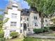 Charming, multi-story building with manicured lawn and mature trees in a desirable community at 1230 Piedmont Ne Ave # 405, Atlanta, GA 30309