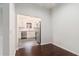Modern kitchen with stainless steel appliances, white cabinets, and gray tile flooring at 1230 Piedmont Ne Ave # 405, Atlanta, GA 30309