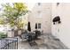 Outdoor patio area featuring multiple tables with chairs and several grills at 1230 Piedmont Ne Ave # 405, Atlanta, GA 30309