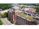 Exterior image of Ponce City Market with rooftop activities and a unique urban setting, highlighting its industrial charm at 1230 Piedmont Ne Ave # 405, Atlanta, GA 30309