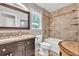 Updated bathroom with granite vanity top, tile shower and tub and stylish fixtures at 5400 Francis Ave, Stone Mountain, GA 30087