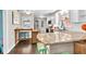 Charming kitchen with white cabinets, stainless steel appliances, and a breakfast bar at 5400 Francis Ave, Stone Mountain, GA 30087