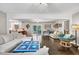 Bright and airy living space with hardwood floors open to kitchen at 5400 Francis Ave, Stone Mountain, GA 30087