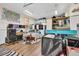 Large studio space with wood floors, colorful decor, and ample space for storage and creative endeavors at 5400 Francis Ave, Stone Mountain, GA 30087