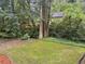 Expansive backyard with lush greenery, mature trees, and a tranquil atmosphere, ideal for outdoor enjoyment at 4801 Deer Chase, Powder Springs, GA 30127