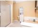 Bright bathroom features a glass enclosed shower, vanity with white cabinets and decorative shelving at 4801 Deer Chase, Powder Springs, GA 30127