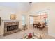 Bright living room with stone fireplace and dining area, perfect for entertaining at 4801 Deer Chase, Powder Springs, GA 30127