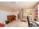A versatile space features a home office area, laundry access and a comfortable lounge at 4801 Deer Chase, Powder Springs, GA 30127