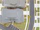 Bird's eye view of a residential house showing the roof, driveway, and neatly landscaped yard at 1010 Fendley St, Woodstock, GA 30188