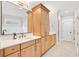 Bathroom featuring double sinks and ample storage space at 1010 Fendley St, Woodstock, GA 30188