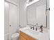 Bathroom with a white quartz sink, and a walk-in shower at 1010 Fendley St, Woodstock, GA 30188
