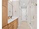 This is a bathroom with double sinks and a glass shower at 1010 Fendley St, Woodstock, GA 30188