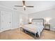 Bedroom featuring a ceiling fan, and a bed with white linens at 1010 Fendley St, Woodstock, GA 30188