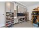 Garage with storage cabinets, a refrigerator, and custom storage solutions at 1010 Fendley St, Woodstock, GA 30188
