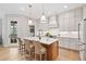 Beautiful kitchen featuring stainless steel appliances and island seating at 1010 Fendley St, Woodstock, GA 30188