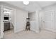 This living room features a classic popcorn machine and an adjacent bathroom at 1010 Fendley St, Woodstock, GA 30188