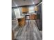 Spacious kitchen with modern stainless steel appliances, granite countertops, and stylish flooring at 1962 Bridgestone Cir, Conyers, GA 30012