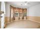Bedroom with neutral walls, decorative window coverings, tile floors and ceiling fan at 3185 Oak Ridge Ln, Loganville, GA 30052