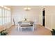 Bright dining area with bench seating, and natural light streaming through large windows at 330 Bay Grove Rd, Loganville, GA 30052