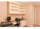 Office space featuring built-in shelving and work space at 330 Bay Grove Rd, Loganville, GA 30052