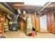 Basement mechanical area with utilities like furnace and water heater, plus storage space at 3421 Fawn Trl, Marietta, GA 30066