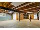 Unfinished basement with concrete floors, cinder block wall, and open ceiling showing mechanicals at 3421 Fawn Trl, Marietta, GA 30066