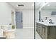 Spacious bathroom features a double sink vanity, walk-in shower, and modern fixtures at 3421 Fawn Trl, Marietta, GA 30066