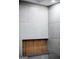 Close up detail of a shower niche with wood slat details and gray tile at 3421 Fawn Trl, Marietta, GA 30066