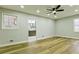 Bright bedroom featuring hardwood floors, neutral walls, and a ceiling fan at 3421 Fawn Trl, Marietta, GA 30066