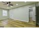 Spacious bedroom features a ceiling fan, closet, and natural light, creating a comfortable and inviting atmosphere at 3421 Fawn Trl, Marietta, GA 30066