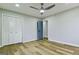 Spacious bedroom with a ceiling fan and wood floors, offering a comfortable and stylish living space at 3421 Fawn Trl, Marietta, GA 30066