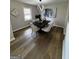 Elegant dining room featuring modern chandelier, black dining table and stylish decor at 3421 Fawn Trl, Marietta, GA 30066