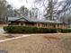 Charming brick ranch home with mature landscaping and inviting front entrance at 3421 Fawn Trl, Marietta, GA 30066