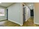 Long hallway with access to several rooms and wood floors throughout at 3421 Fawn Trl, Marietta, GA 30066
