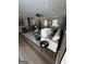 Bright and inviting living room boasting modern finishes, stylish furniture, and refinished floors at 3421 Fawn Trl, Marietta, GA 30066