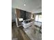Comfortable living room with accent wall, plush sofa, and modern decor at 3421 Fawn Trl, Marietta, GA 30066