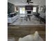 Spacious living room with fireplace, modern furniture, and sliding glass door to the yard at 3421 Fawn Trl, Marietta, GA 30066