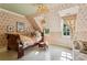 Charming bedroom featuring floral wallpaper, a window nook, and a wooden bed frame at 240 Nacoochee Nw Dr, Atlanta, GA 30305