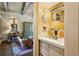 Stylish sitting area featuring a marble counter with views to the main living room at 240 Nacoochee Nw Dr, Atlanta, GA 30305