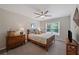Cozy bedroom with neutral walls, ceiling fan, and furniture arranged for a relaxing atmosphere at 310 Medridge Dr, Alpharetta, GA 30022