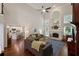 Spacious living room boasts high ceilings, large windows, a fireplace, and an open layout into a modern kitchen at 310 Medridge Dr, Alpharetta, GA 30022