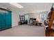 Large office featuring a work desk, shelves for storage, and natural lighting from the surrounding windows at 310 Medridge Dr, Alpharetta, GA 30022