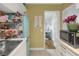 Compact kitchen featuring white cabinets, with a vintage refrigerator and stainless steel sink at 314 3Rd Ne St # 4, Atlanta, GA 30308