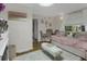 Bright living room with a daybed, fireplace, area rug, and natural light from a window at 314 3Rd Ne St # 4, Atlanta, GA 30308