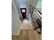 Newly constructed staircase with modern railings and a decorative glass window at 1340 Stoneleigh Way, Stone Mountain, GA 30088