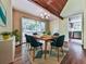 Dining room featuring wood ceiling and large window with view to outdoors at 1467 Shiloh Trail East Nw, Kennesaw, GA 30144