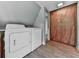 Laundry area complete with appliances and storage cabinets for a convenient space at 1467 Shiloh Trail East Nw, Kennesaw, GA 30144