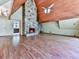 Spacious living room featuring fireplace, spiral staircase, and wood ceiling at 1467 Shiloh Trail East Nw, Kennesaw, GA 30144